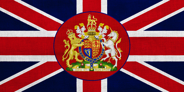 Flag and coat of arms of Great Britain on a textured background. Concept collage.