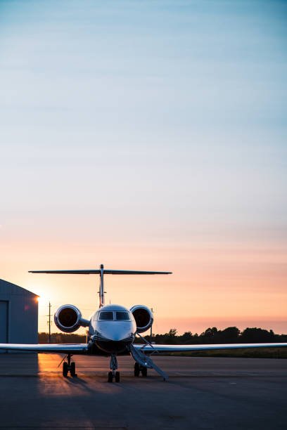 istock Private Jet Parked at an Airport 1556366783