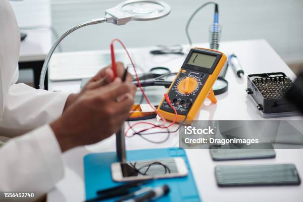 Computer Engineering Multimeter Engineer Using Multimeter Stock Photo - Download Image Now - 25-29 ...