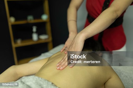 istock A beautiful woman is taking Thai spa massage procedure 1556465219