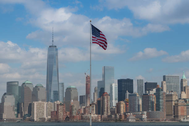 istock New York Skyline with the American Flag 1556483071