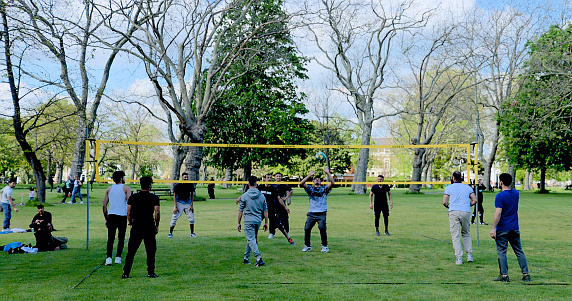London, UK,  6 May 2023 : People playing volleyball in London Park