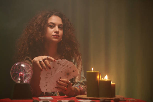 istock Fortune Teller with Tarot Cards 1556503504