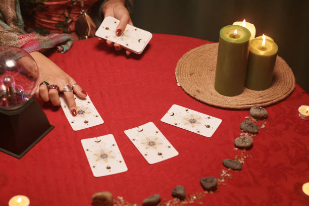 istock Seer Reading Tarot Cards on Table 1556503510