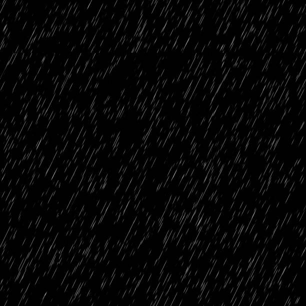 istock Heavy rain wall falling in front of the camera against black screen. Raindrops splashing. Rain closeup vfx insert. Practical seamlessly loopable footage. Heavy rainstorm hitting black surface. 1556504117