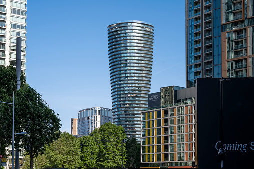 New residential buildings with outdoor facilities, apartment tower in Canary Wharf.