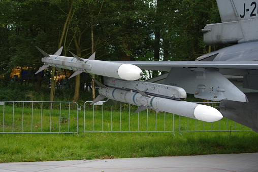 AMRAAM AIM-120  Advanced Medium-Range Air-to-Air Missile AMRAAM  under the wing of a F16 fighting falcon at Leeuwarden air base september 2011 the netherlands