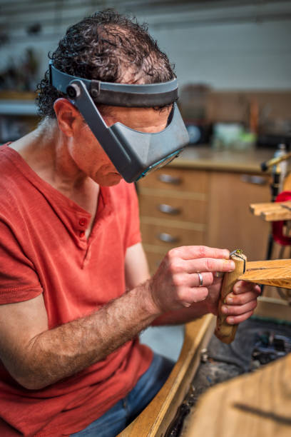 istock Jeweller repairing a ring 1556523338