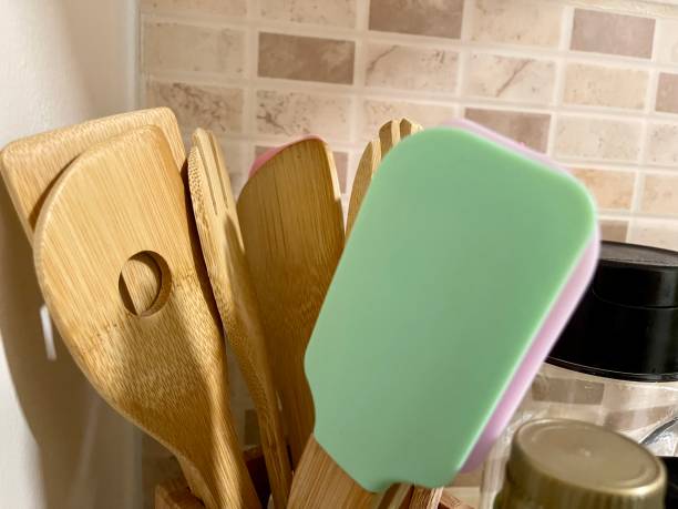 istock Wooden forks and spoons, wooden dinner spoons. 1556529119