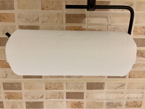 White paper towel on the kitchen wall
