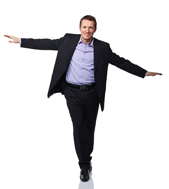 istock caucasian man try to balance himself 155653333