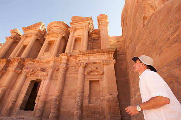istock Man tourist at the monastery, Ed Deir.Petra. Jordan 155655803