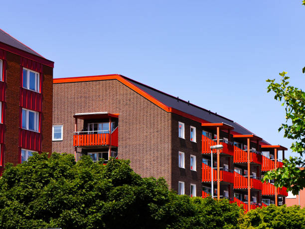 istock Low angle view of buildings against sky 1556620993