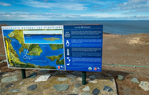 Punta Arenas, Chile - February 24, 2023:  Entrance Table and Information Map at Magdalena Island Famous Penguin Reserve National Monument in Strait of Magellan, Chilean Patagonia
