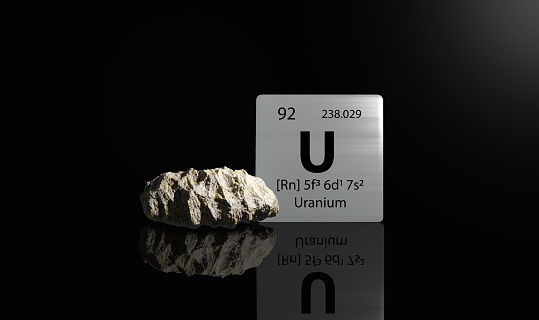 Uranium element on a metal periodic table with yellowish grey metamictic Uranium on dark background. 3D rendered icon and illustration.