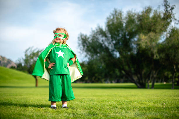 istock Little Girl Superhero 1556642104
