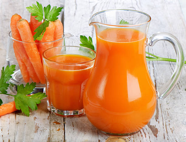 istock Healthy food - carrots and juice 155664584