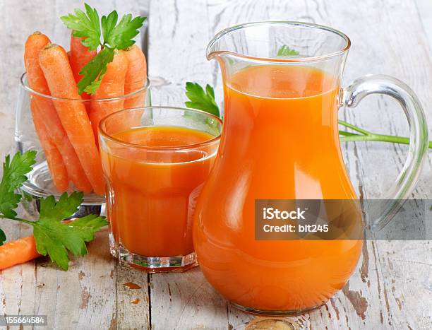 Healthy Food Carrots And Juice Stock Photo - Download Image Now - Carrot, Cruet, Crunchy