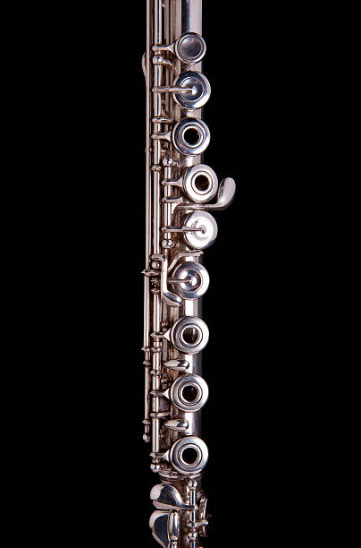 Close up Silver Flute in black background stock photo