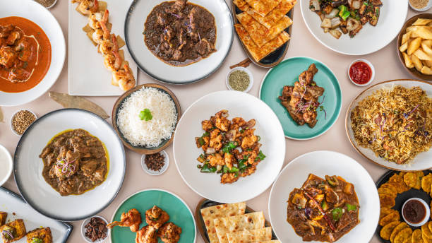 Indian Fusion Food Table. Table top view of Indian Fusion food setup on table. restaurant table layout stock pictures, royalty-free photos & images