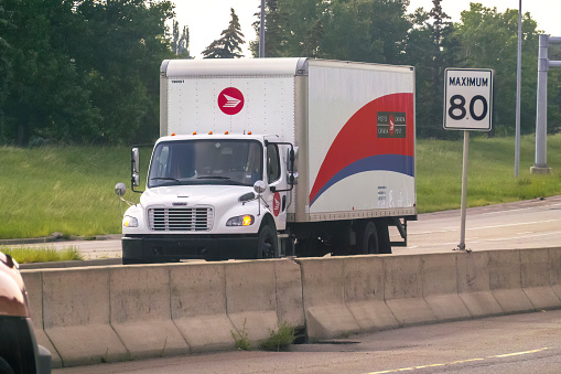Calgary, Alberta, Canada. Jul 19, 2023. A Canada Post delivery truck on the route.