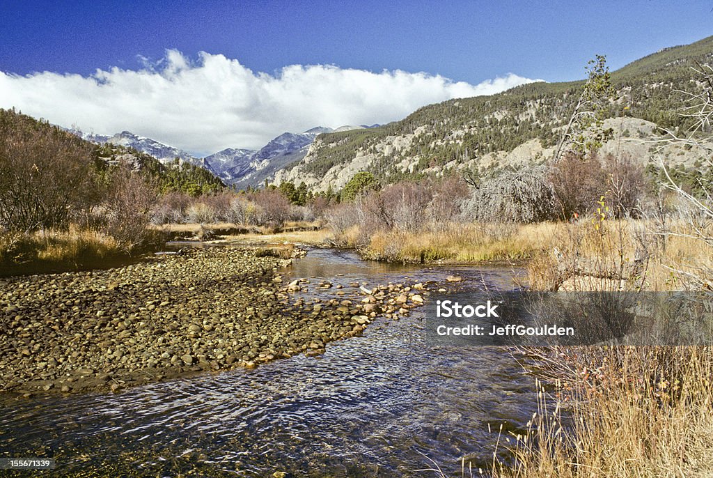 Big Thompson River The Big Thompson River is a 78 mile tributary of the South Platte River in Colorado. The headwaters of the Big Thompson River begin in the Rocky Mountains near the Continental Divide at Forest Canyon. On July 31, 1976 the Big Thompson River was the site of a huge flash flood that swept down the steep and narrow canyon, killing 143 people. The flood was triggered by a thunderstorm near the upper section of the canyon that dumped 12 inches of rain in less than 4 hours. Very little rain fell in the lower section of the canyon, where many of the victims were. The Big Thompson River was photographed as it meandered alongside the Cub Lake Trail in Rocky Mountain National Park near Estes Park, Colorado, USA. Beauty In Nature Stock Photo