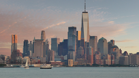 The soaring World Trade Tower is surrounded by other edifices of the global finance and economic world.