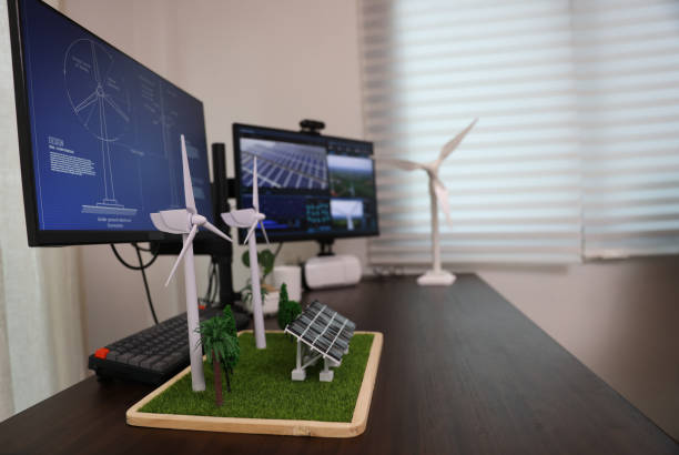 istock the professional property on a tablet with a black screen mock-up display. Creating a Concept of Wind Turbine and solar panel energy in an Office. 1556728227