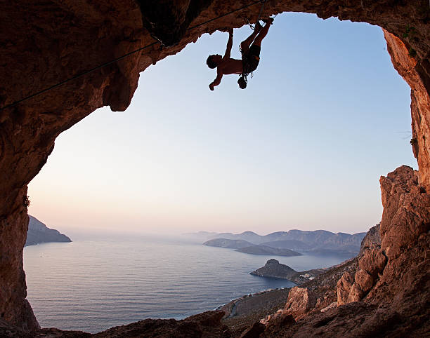 istock Silhouette of a rock climber at sunset 155674228