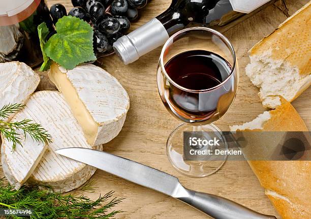 Red Wine Brie And Camembert Cheeses With Bread Stock Photo - Download Image Now - Cheese, Wine, Baguette