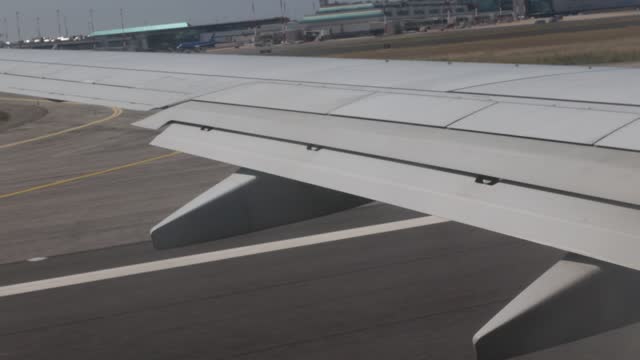 Detail of the aircraft wing during take-off