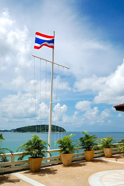 istock Terrace with sea view and Thai flag at luxury hotel 155676903