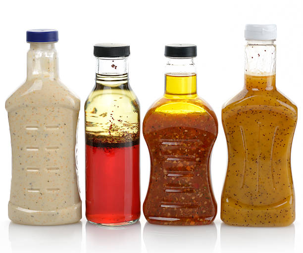 Salad Dressings Assortment Of Salad Dressing Bottles salad dressing photos stock pictures, royalty-free photos & images