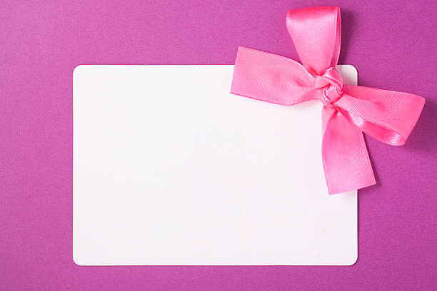 istock Card with pink ribbon bow has space for text 155687978