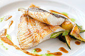 Grilled turbot fish with vegetables.