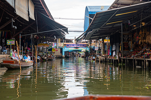 Famous floating market in Thailand, Damnoen Saduak floating market, tourists visiting by boat, Ratchaburi, Thailand. July 5, 2023