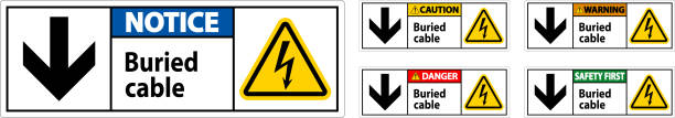 istock Danger Sign Buried Cable With Down Arrow and Electric Shock Symbol 1556911618