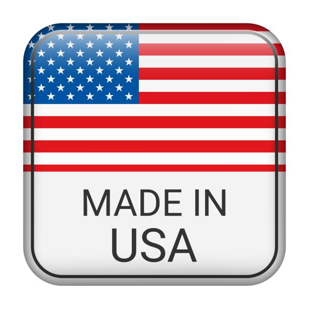 istock Made in USA badge vector. Sticker with stars and national flag. Sign isolated on white background. 1556922628