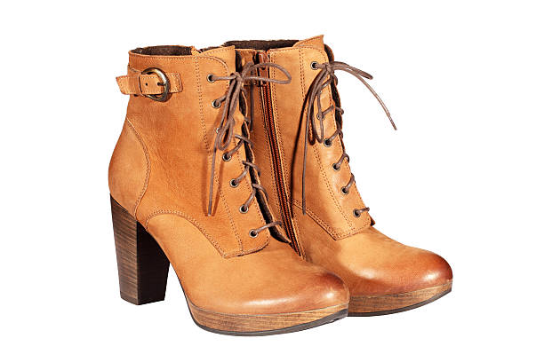 istock Pair of brown female boots. 155692724
