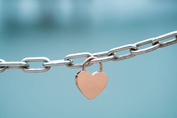 istock Heart-shaped lock with a wish for eternal love 1556943402