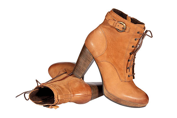 istock Pair of brown female boots. 155695417