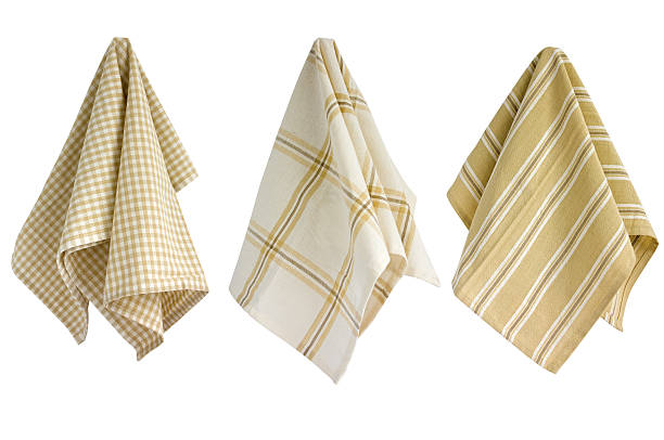Tan And White Kitchen Towels Hanging Stock Photo - Download Image