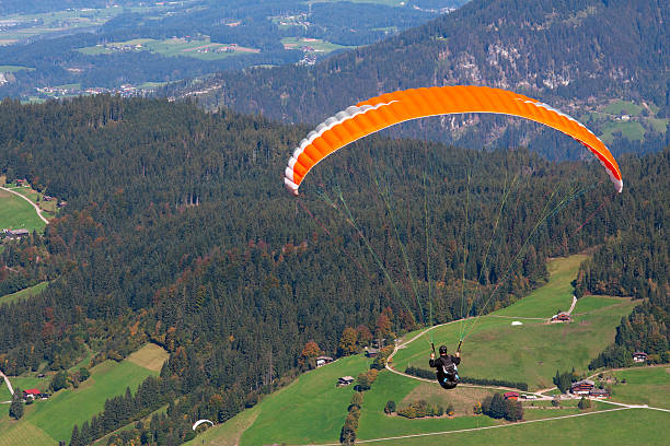 istock Paraglider in front of mountain 155700671