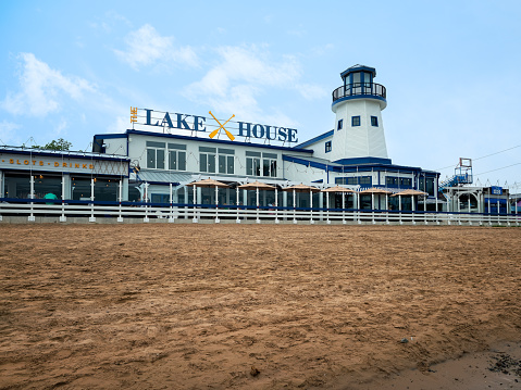 Sylvan Beach, New York - July 2, 2023: Landscape View of The Lake House at Sylvan Beach Overlooking Oneida Lake, The Lake House is a Casino and 18+ Restaurant which is a Conglomerate of Corner Stone Resort.