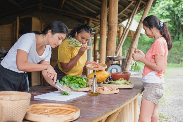 istock Group of Female Friends in a Cooking Class 1557057249