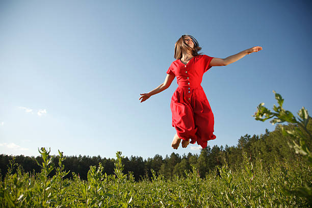 Mulher em vermelho - fotografia de stock