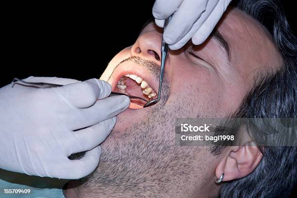 Examen Dental Foto de stock y más banco de imágenes de Dentista - Dentista, Paciente, Adulto