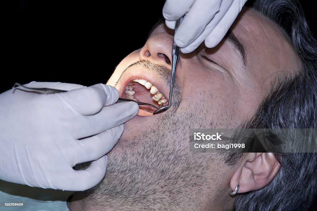 Un examen dentaire - Photo de Dentiste libre de droits