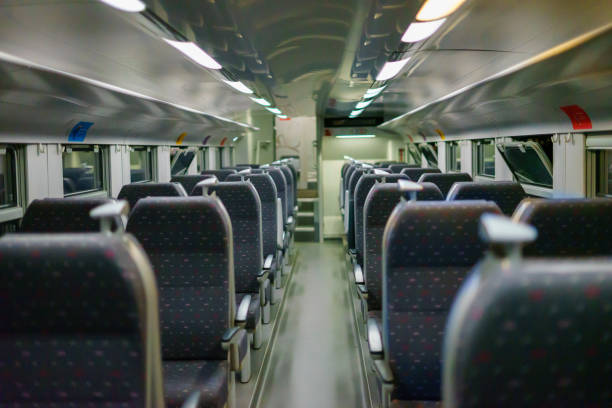 istock View of wagon with seats nobody with artificial lighting 1557136577