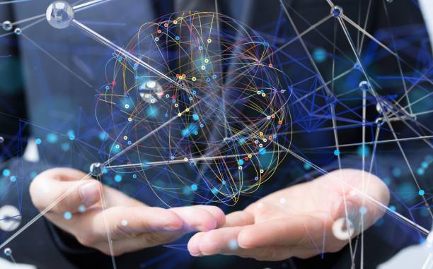 istock Businessman holding his palms under a delicate sphere hologram surrounded by connected lines 1557136645